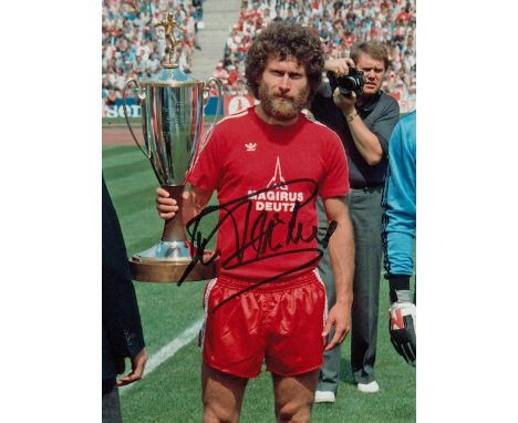 Autographed PAUL BREITNER 8 x 6 photo : Col, depicting Bayern Munich's PAUL BREITNER posing with the German Player of the Yea