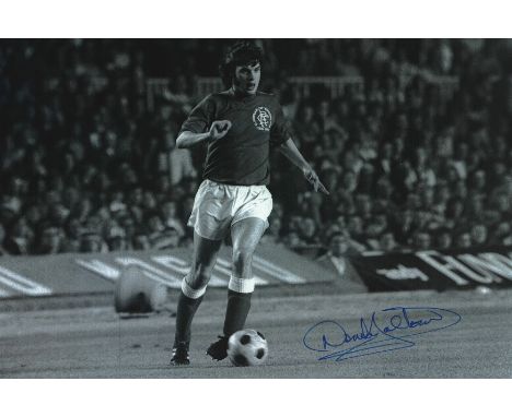 Autographed DEREK JOHNSTONE 12 x 8 photo : B/W, depicting Rangers DEREK JOHNSTONE in full length action with the ball at his 