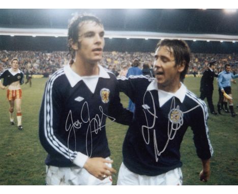 Autographed SCOTLAND 8 x 6 photo : Col, depicting Scotland's JOE JORDAN and DON MASSON celebrating arm in arm as they make th