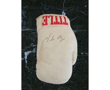 Charlie Magri signed white signed Title boxing glove. Carmel Magri (born 20 July 1956), who boxed under the name Charlie Magr
