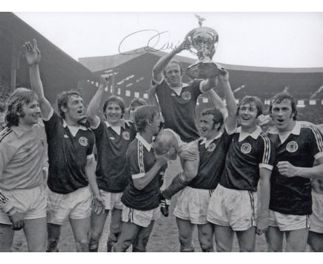 Autographed ARCHIE GEMMILL 8 x 6 photo : B/W, depicting Scotland captain ARCHIE GEMMILL holding aloft the British Championshi