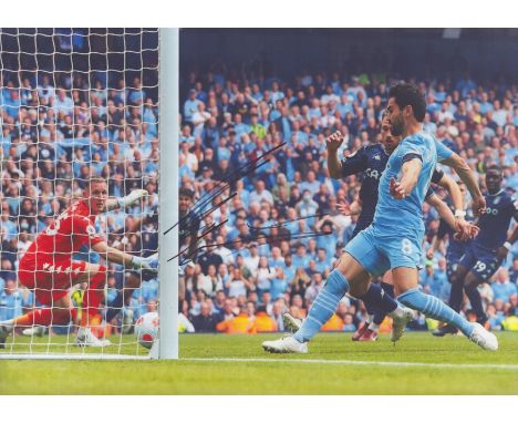 Ilkay Gundogan signed 12x8inch colour photo pictured in action for Manchester City. Good condition. All autographs come with 