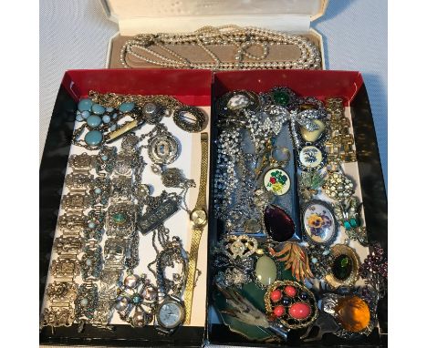 A Collection of vintage costume jewellery which includes pearl necklaces, Scottish brooches, Stratton compact and cigarette c