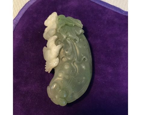 Antique Chinese hand carved jade sculpture of a piece of fruit, bird and flowers. Measures 8cm in length