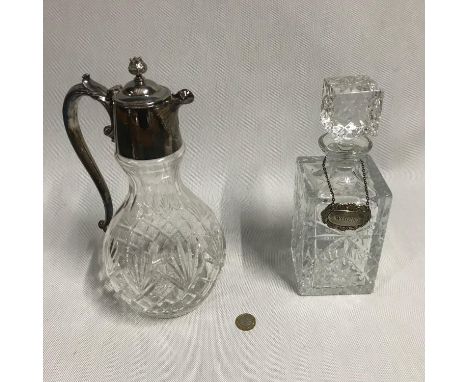 A Stuart Crystal Claret Jug together with a crystal cut decanter with Plated whisky label. 