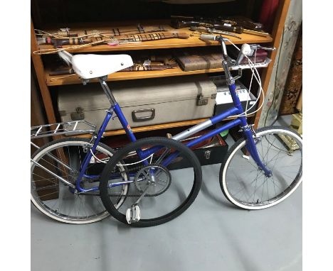 A Vintage ladies bike with spare wheel, produced by Elswick Hopper Cycles. 