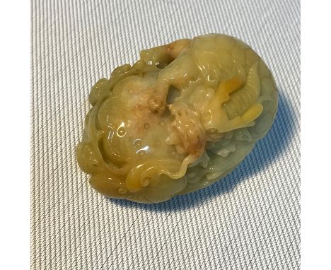 Antique Chinese jade hand carved sculpture, designed as a dragon/ turtle holding a swirling flower, Bat with spread wings to 