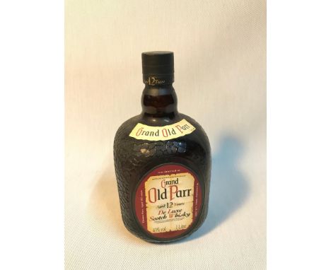 A Bottle of Grand Old Parr aged 12 years De Luxe Scotch Whisky. 1 litre bottling- 43% Vol. Full and sealed 