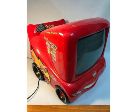 A Vintage Disney CARS lightning McQueen Child's TV with remote. In a working condition 