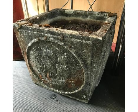 A Vintage garden planter designed with galleons to each panel. Measures 34cm in height. 