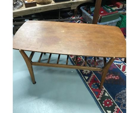 A Retro teak Coffee table with spar design shelf. Produced by Nathan. 