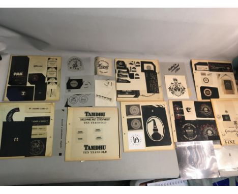 A Collection of Original Film Prints of Various Whiskey's, and Other Marketing Logos to include EMVA, CRUSH, Coffe mate, JET,