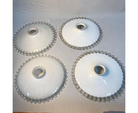 A Set of four antique milk glass and pie crust edge light shades, Measure 25cm in diameter. 