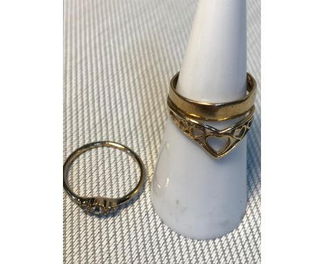 A Ladies Birmingham 9ct gold wedding band, 9ct gold heart shaped design ring and costume ring. Total weight of Gold 2.83grams