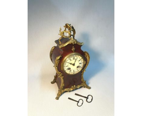 A French 19th century Louis XIV Style tortoiseshell &amp; Ormolu mounted mantle clock,.Ccomes with two keys and pendulum. Mea