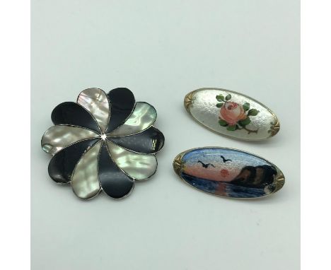 A Lot of two silver 925S and enamel brooches (Pins missing) together with Sterling silver and mother of pearl brooch. 
