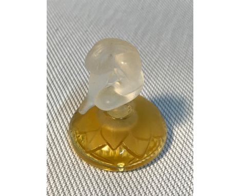 A Vintage Lalique Nude lady perfume bottle. Measures 4cm in height 