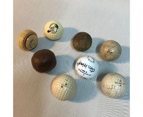 A Lot of antique and vintage golf balls which includes Leather and feather ball, Align Pure strike ball, Old looking ball, Th