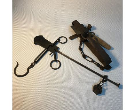 Antique hanging weighing scales together with antique hunting trap. 