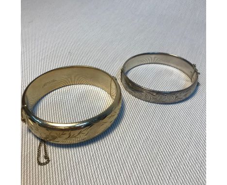 Two Birmingham silver solid bangles. One made by W T TOGHILL &amp; Co and the gilt silver bangle by H. Samuel Ltd. 