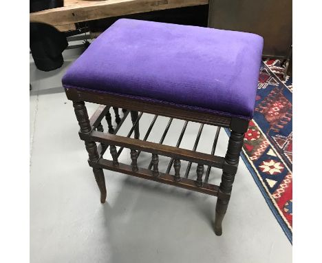 Antique piano stool designed with spar shelf storage, supported on Cabriole legs. 