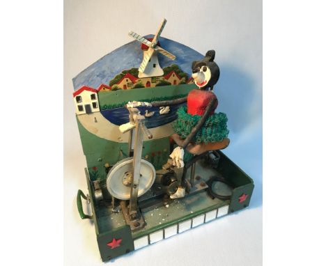 A Vintage hand made amusement park Minnie Mouse style mechanical figure display. Measures 34cm in height 