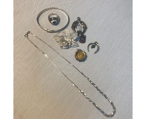 A Selection of silver jewellery which includes Silver double dolphin and clear stone pendant, Gilt and enamelled 1857 four pe