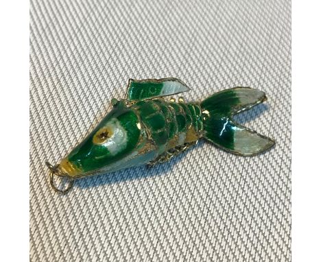 A Silver and enamel movable fish pendant. 