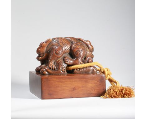 CHINESE SANDALWOOD "DRAGON" SEAL. 5 3/4 in or 14.6 cm wide.