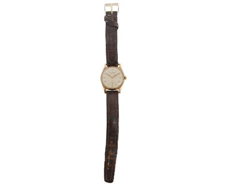 A 9ct Buren Grand Prix wristwatchchampagne dial alternating Arabic and triangular batons with subsidiary seconds, 9ct gold ca