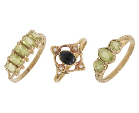 Three Victorian-style ringstwo 9ct yellow gold and peridot-set rings, and an oval black hardstone cabochon with a seed pearl 