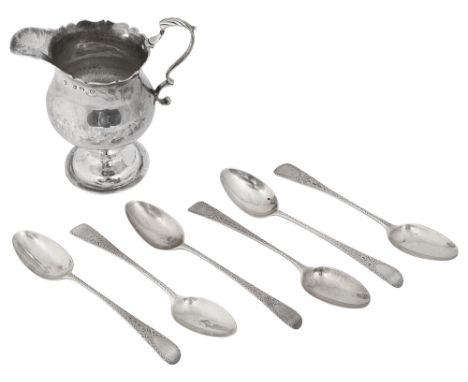 An early George III silver ogee pedestal cream jug and a matched set of George III bright cut teaspoonsfirst London, 1767 by 