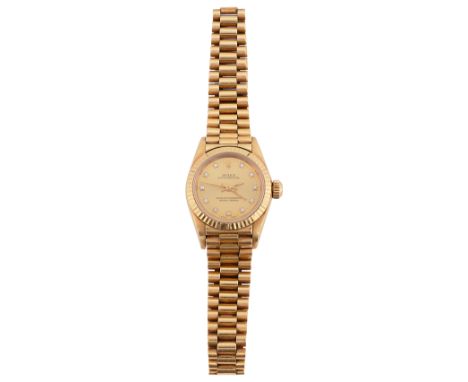 A lady's 18ct yellow gold Rolex Oyster Perpetual wristwatchthe gilt dial signed Rolex Oyster Perpetual Superlative Chronomete