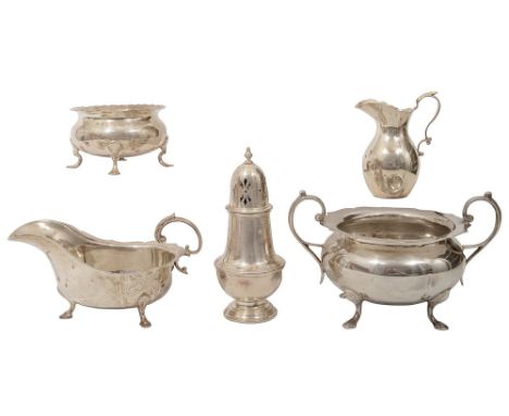 Edwardian and later silver to include two sugar basins, a sauce boat, a baluster form cream jug and a baluster form sugar cas