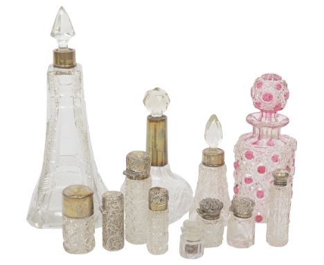 Victorian and later silver mounted cut glass scent bottles and smelling saltsvarious dates, makers marksto include a silver c