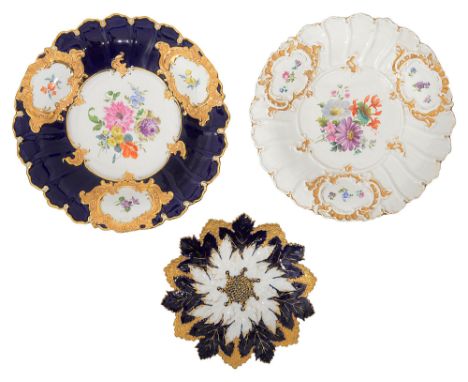 A collection of three Meissen plates,including: an early 20th century cabinet plate, moulded with decoration in the form of v