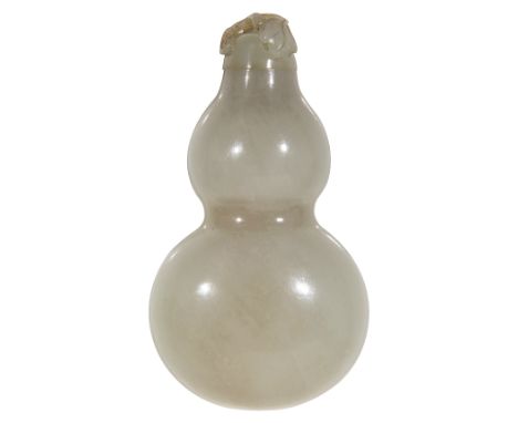 A 19th century Chinese pale celadon jade double gourd snuff bottle of compressed double gourd form, the screw fitting stopper