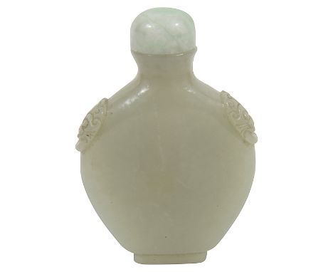 A Chinese pale celadon jade snuff bottle and stopperof flattened ovoid form carved with mask handles, green Peking glass stop