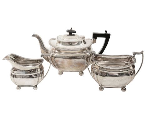 A George V silver three piece tea serviceSheffield, 1904/5, by James Deakin &amp; Sonsof plain oblong form with fluted corner