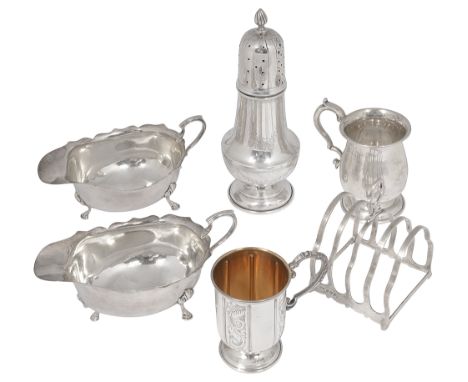 A collection of silver to include a pair of sauce boats, a five bar toast rack and two christening mugsfirst Birmingham, 1934