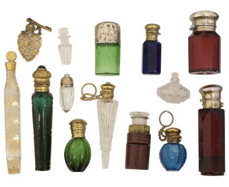 A collection of 19th century glass scent and smelling salt bottlesto include a gilt decorated lachrymatory or tear catcher sc
