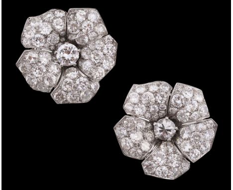 An attractive pair of French Art Deco diamond-set ear clipsattributed to Cartier, each designed as five undulating asymmetric