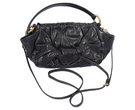 A Prada bow leather handbagleather body with bow detail, a flat leather handle and detachable adjustable strap. With gold col