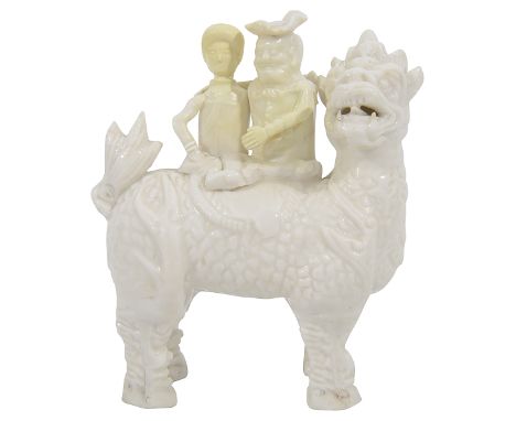 A Chinese Dehua Blanc de Chine European subject figural group c.1700Kangximodelled as a European couple seated on the back of
