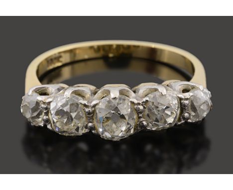 A diamond five stone ringthe graduated cushion-shaped old brilliant-cut diamonds coronet-set to the the plain yellow gold sha