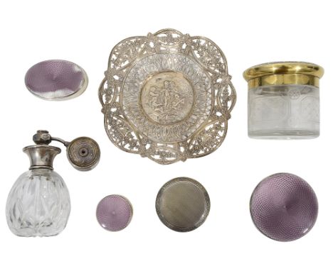 A continental pierced and embossed silver dish, an Asprey silver-gilt topped dressing table jar and other itemsfirst stamped 