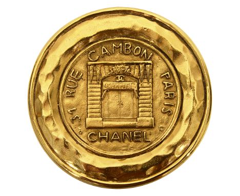 A vintage Chanel medallion brooch,c. 1990s, '31 Rue Cambon Paris, Chanel', design featuring original Chanel shop front, marke