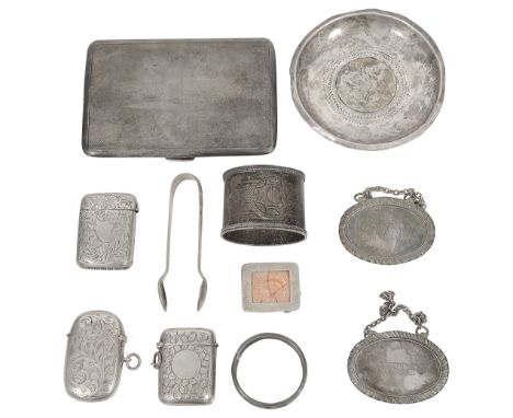 A large George VI engine turned silver cigarette case, a late 19th century Russian napkin ring and other itemsfirst Birmingha