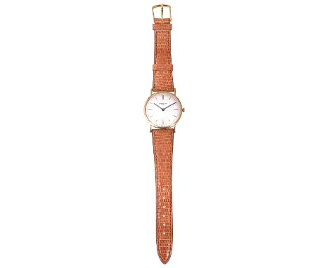 A gentleman's Audemars Piguet 14K gold slim wristwatch circa 1970silvered dial with gilt hour markers and black pointed hands