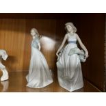 Two Nao Figurines